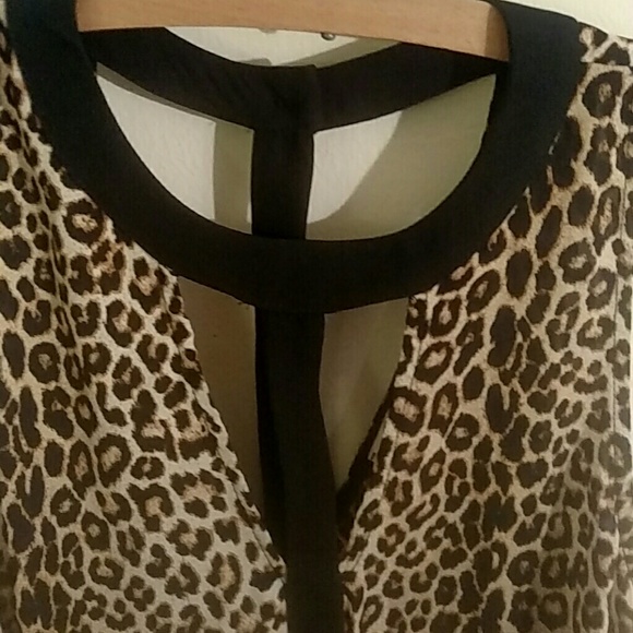 lelis Leopard print sexy sleeveless swing top. - Picture 2 of 4